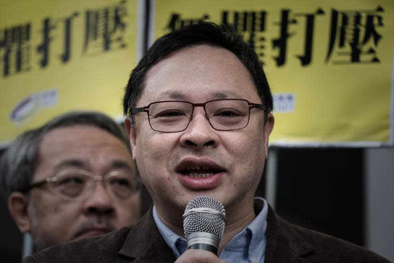 Occupy Central leader Benny Tai talks to the media outside the Wanchai police station in Hong Kong, on March 2, 2015