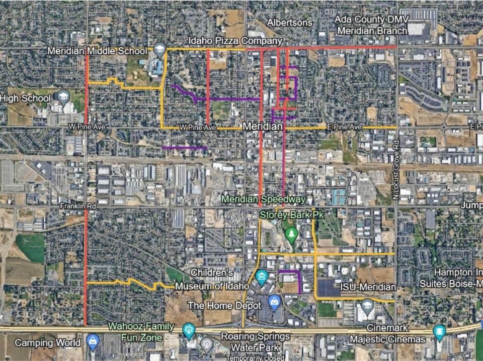 In this map of downtown Meridian, recommended bicycle improvements are outlined in yellow, pedestrian improvements in purple, and roadway improvements in red. Many of the projects would take place north of Pine Avenue and around the Meridian Speedway.