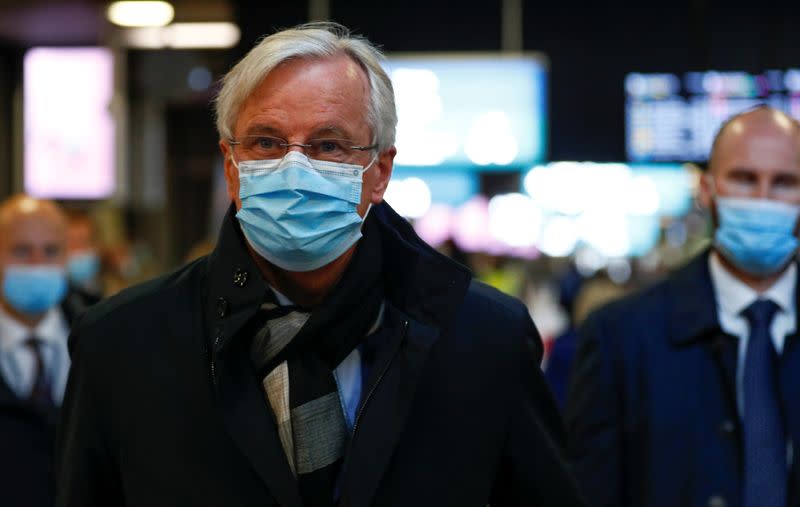 FILE PHOTO: European Union's Brexit negotiator Michel Barnier arrives at Brussels-South railway station, in Brussels