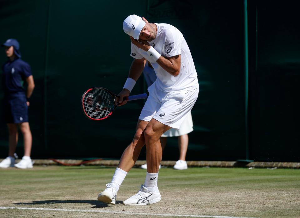 Steve Johnson has to dig one out of his ear - Credit: Alastair Grant/AP