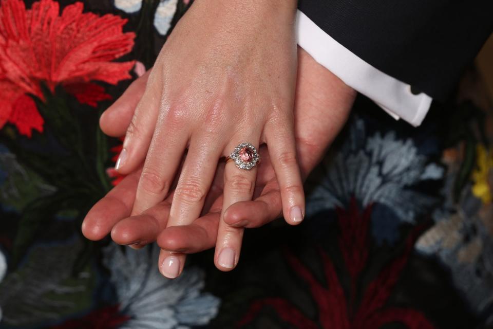 <p>While announcing their engagement, Princess Eugenie revealed her stunning Padparadscha Sapphire and diamond cluster ring. </p>