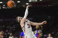 Oklahoma forward Tanner Groves (35) goes after a rebound during the second half of the team's NCAA college basketball game against Florida in Norman, Okla., Wednesday, Dec. 1, 2021. (AP Photo/Kyle Phillips)