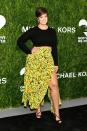 <p>Attending the 12th Annual Golden Heart Awards: We know that Ashley loves a thigh-high split, so this green floral skirt had her name all over it. She kept the rest of the look casual with a black cropped jumper and heels.</p>
