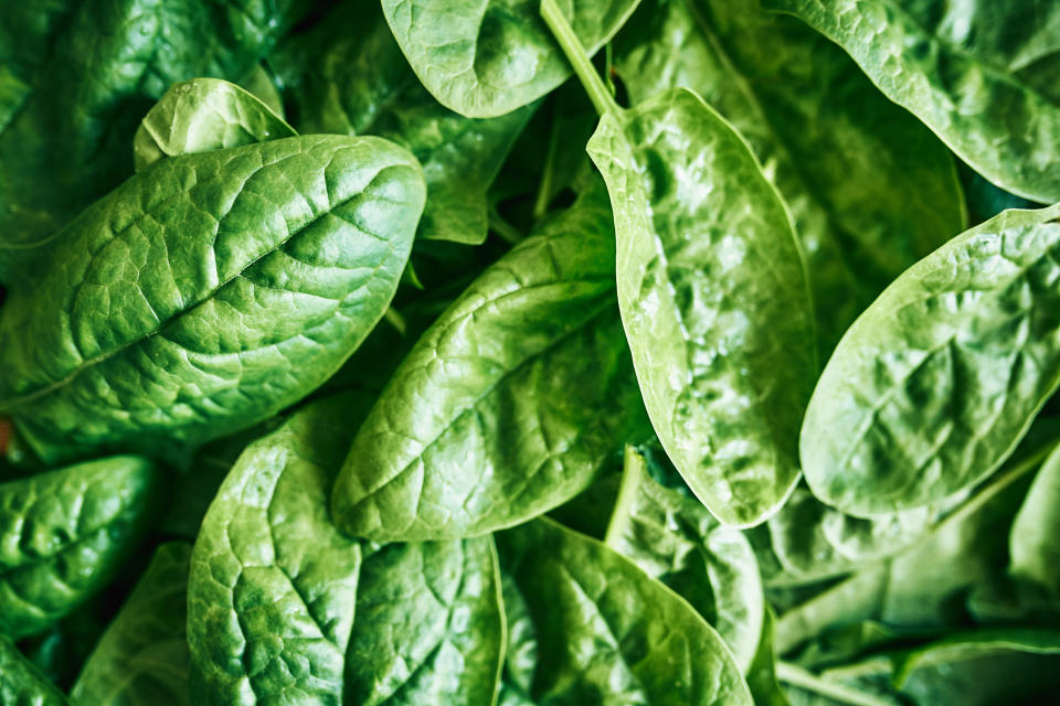 A close-up image of leafy green spinach.