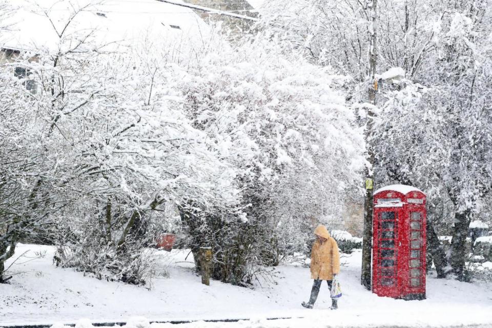 Parts of the UK will be blanketed in snow (Owen Humphreys/PA )
