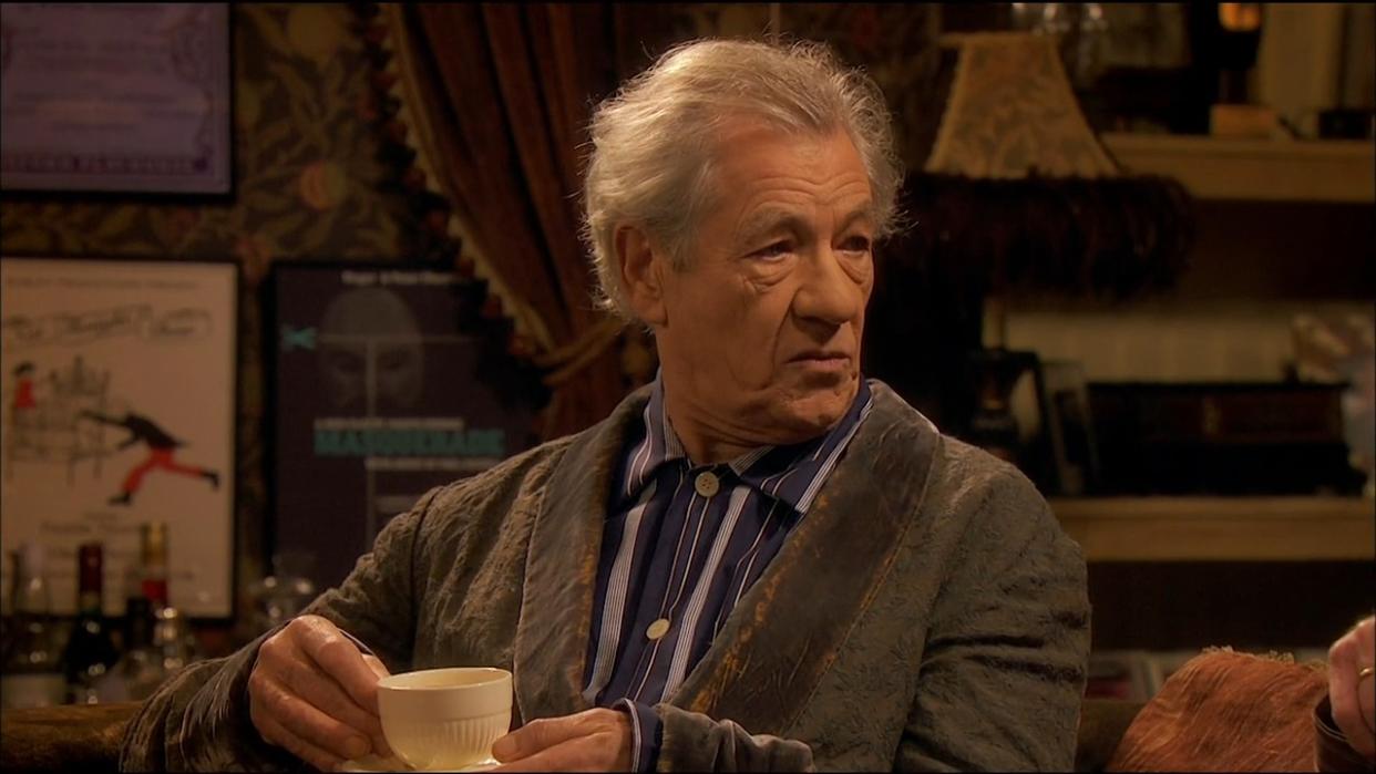  Ian McKellen sitting in a chair in ITV's Vicious. 