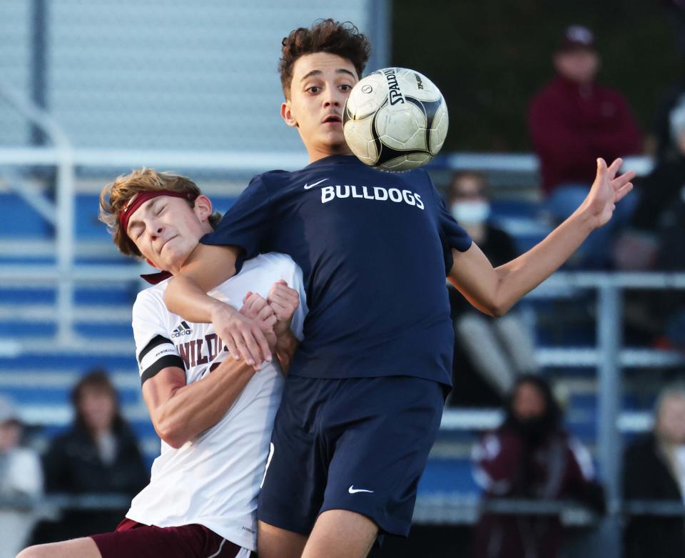 Rockland's Joao Faria, right, and West Bridgewater's Ryan Hulme, go after a loose ball during a game on Saturday Nov. 13, 2021. 
