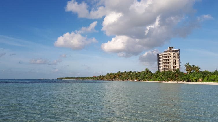 A hotel under construction on an island