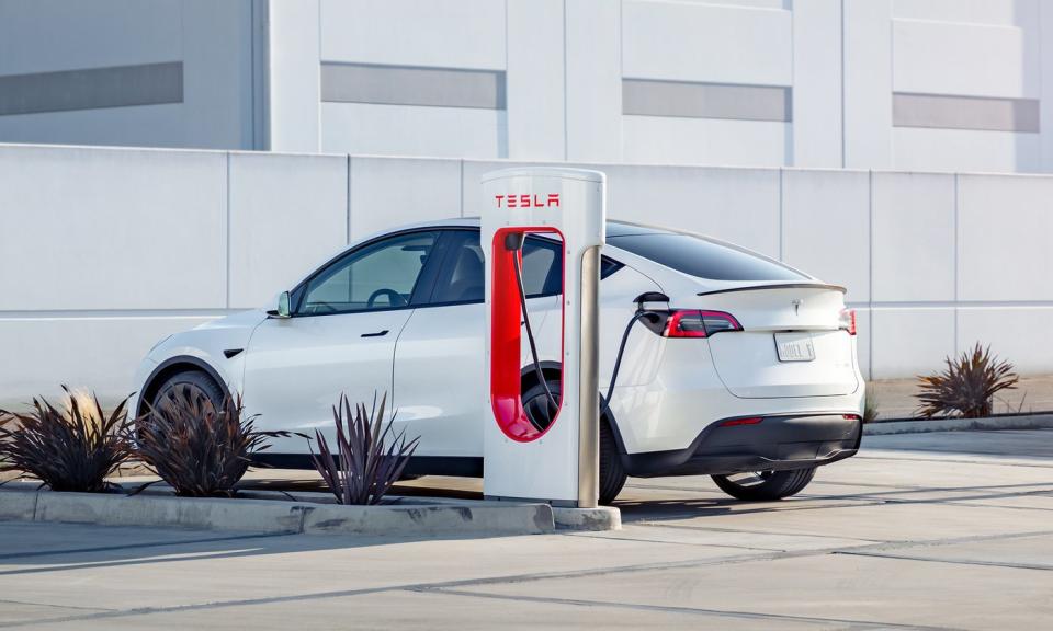 Tesla car parked at charging station