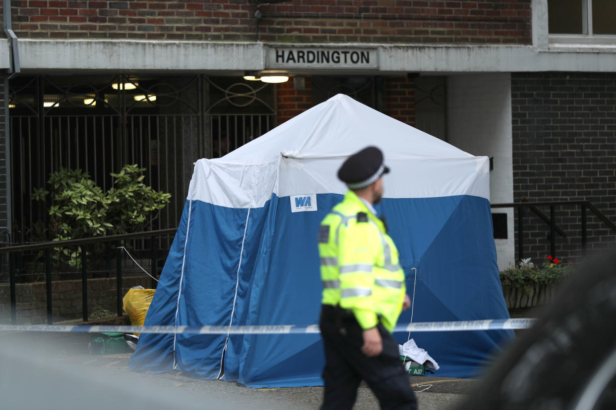 A police tent at the scene on Belmont Street, Camden, north-west London, where a woman, believed to be in her 20s, was stabbed to death late on Sunday night.