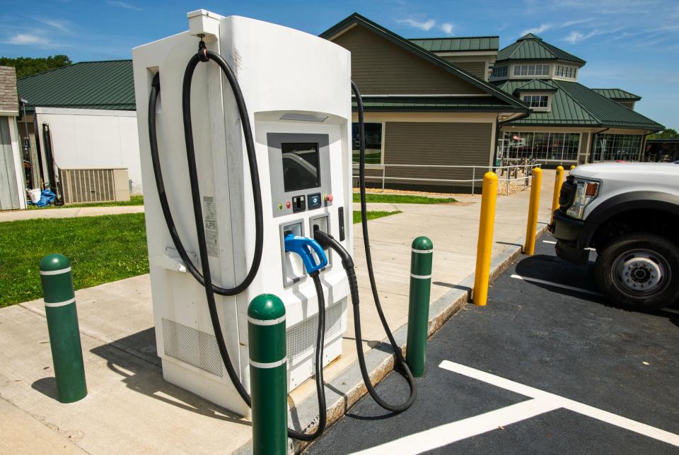 An electric vehicle charging station at the Mass Pike westbound rest area in Charlton.