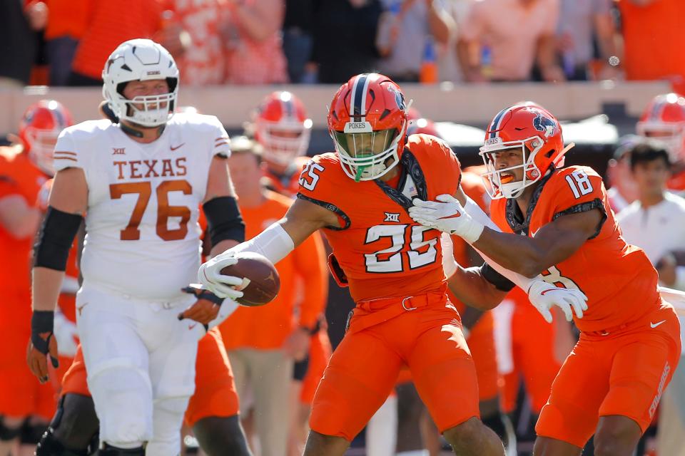 Oklahoma State safety Jason Taylor II (25) will appear at the NFL Scouting Combine this week.