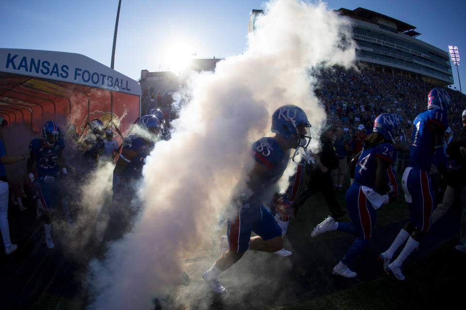 Kansas Jayhawks exit the tunnel during pregame introductions before taking on the Rhode Island Rams on September 3, 2016 at Memorial Stadium in Lawrence, Kansas. (Getty Images)