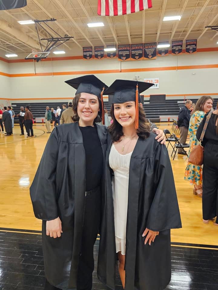 Chelsea Pence and Kennedy Lee standing together after graduation at Greenfield High School in Greenfield, Tennessee on Friday, May 17, 2024.