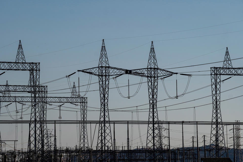 Image: Electrical transmission towers at a Pacific Gas and Electric (PG&E) electrical substation during a heatwave in Vacaville, Calif., on  Sept. 4, 2022. (David Paul Morris / Bloomberg via Getty Images)