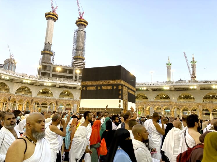 Thousands of Muslim pilgrims circumambulate around the Kaaba, the cubic building at the Grand Mosque, in the Saudi Arabia's holy city of Mecca, Tuesday, July 5, 2022. Saudi Arabia is expected to receive one million Muslims to attend Hajj pilgrimage, which will begin on July 7, after two years of limiting the numbers because coronavirus pandemic. (AP Photo/Amr Nabil)