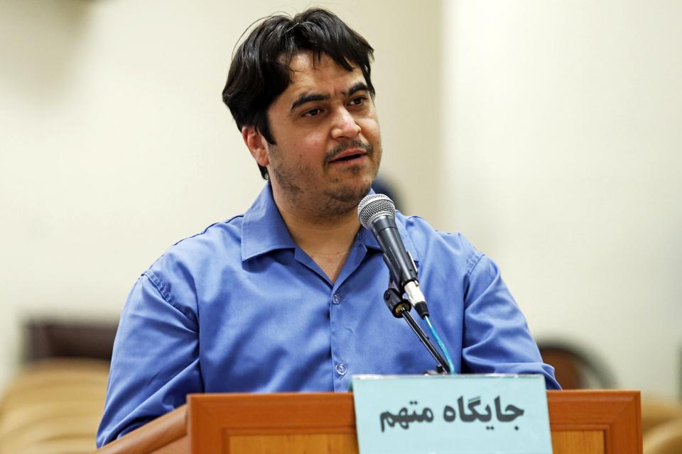 FILE - In this June 2, 2020 file photo, journalist Ruhollah Zam speaks during his trial at the Revolutionary Court in Tehran, Iran. A report released by Amnesty International Wednesday, April 21, 2021, said despite a worldwide drop in death sentences, countries in the Middle East remained among the world’s leading executioners. The report particularly lamented Iran's execution of juveniles, political opponents and journalists. In December 2020, Iran hanged Zam, who launched a popular news channel that helped spark nationwide economic protests. (Ali Shirband/Mizan News Agency via AP, File)