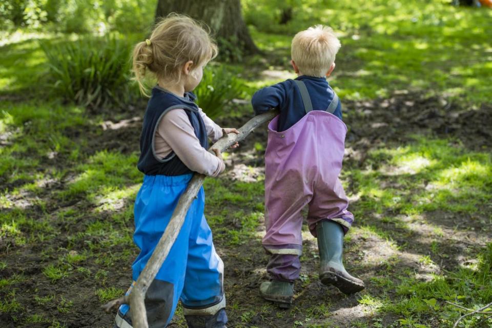 Children enjoy activities ranging from making mud pies, treasure hunts, bark rubbing, looking at “mini-beasts”, balancing, running, climbing and making bridges and swings (Alex Lentati)