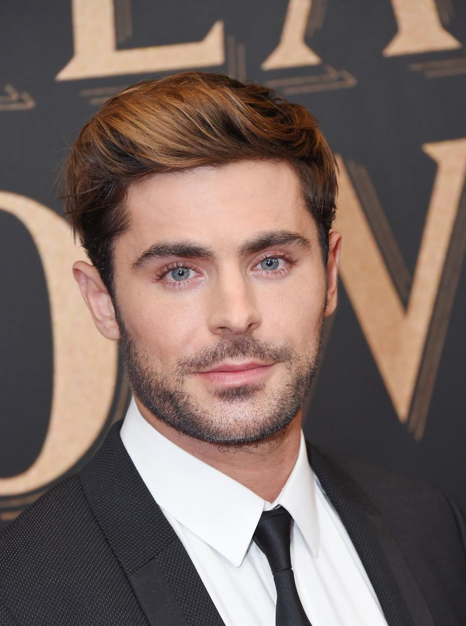 <p>While Zac Efron is known to change up his hair often (remember the Troy Bolton cut?), these days we're used to seeing a short dirty blonde style. </p>