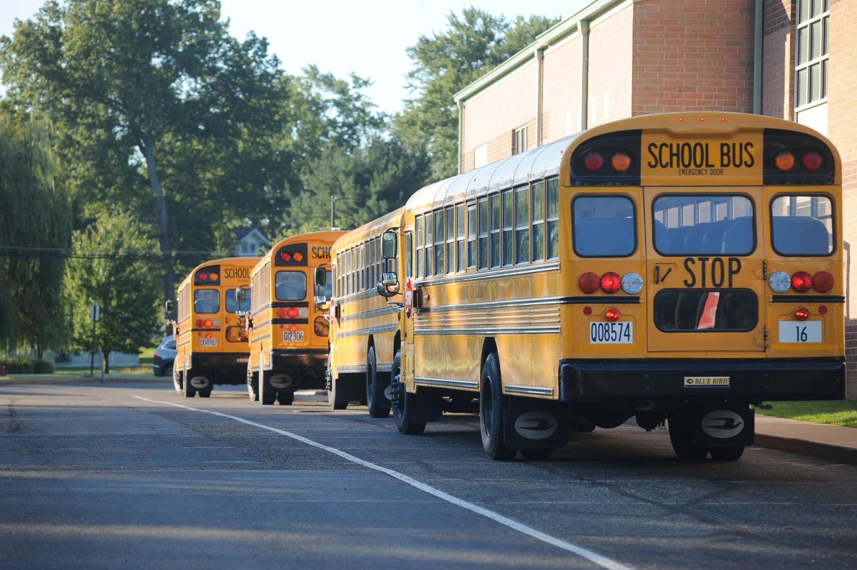 Buses line up to drop off students Thursday, Aug. 18, 2022, the first day of classes at Alliance Elementary School. Students in the district have staggered starting days at the beginning of the 2022-23 school year.