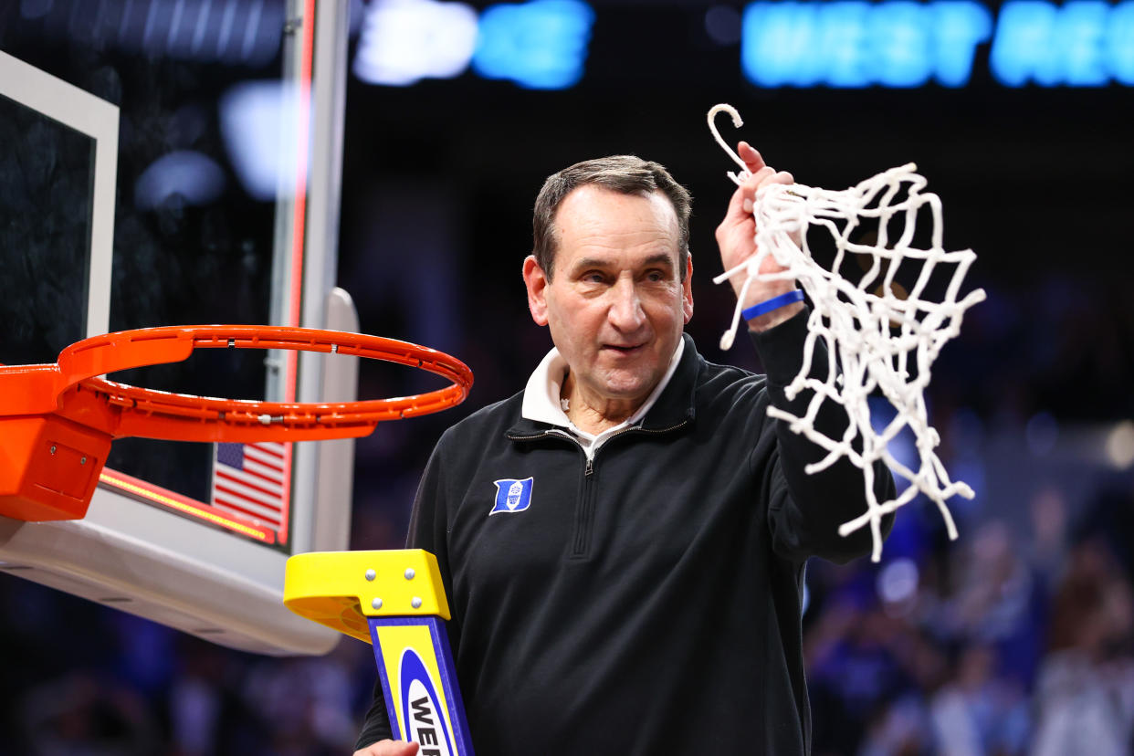 SAN FRANCISCO, CA - MARCH 26: Head coach Mike Krzyzewski of the Duke Blue Devils celebrates the win against the Arkansas Razorbacks during the Elite Eight round of the 2022 NCAA Mens Basketball Tournament held at Chase Center on March 26, 2022 in San Francisco, California. (Photo by Jamie Schwaberow/NCAA Photos via Getty Images)