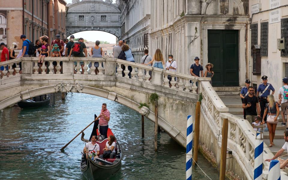 A gondola on a canal in Venice - Bloomberg