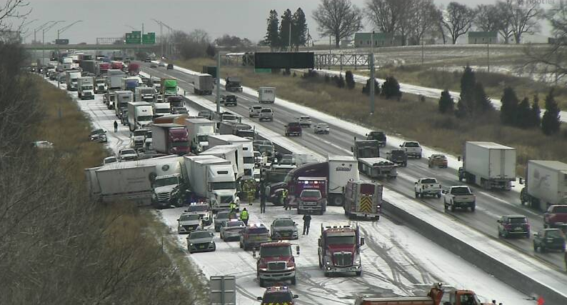 Officials work the scene of a wreck on Interstate Highway 80 between Altoona and the east mixmaster on Monday, Dec. 9, 2019.