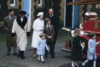 <p>The royal family visit a museum in Sandringham, where the children climb on a fire engine. From left to right: Prince Charles, Princess Diana, Queen Elizabeth II, Prince Harry, wearing a blue coat, Peter Philips, Prince Philip, Duke of Edinburgh, Zara Phillips and Prince William.</p>