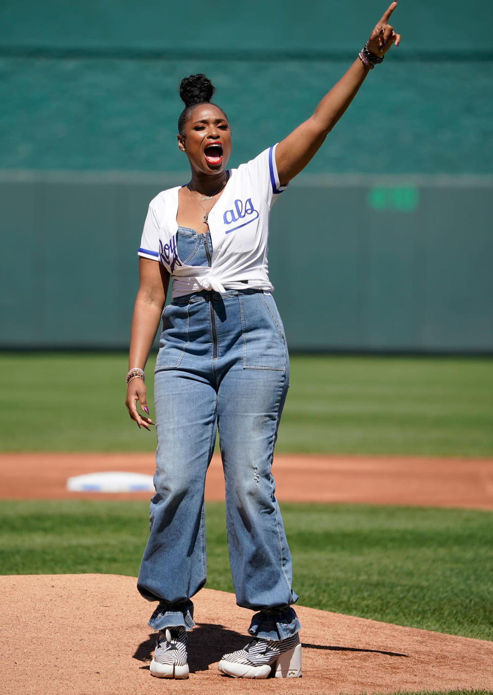 <p>Jennifer Hudson hits a high note after throwing out the ceremonial first pitch ahead of a Kansas City Royals vs. Chicago White Sox game in Missouri on Aug. 9. </p>