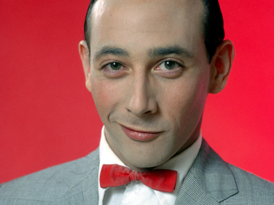 Actor Paul Reubens poses for a portrait dressed as his character Pee-wee Herman in May 1980 in Los Angeles. / Credit: Michael Ochs Archives/Getty Images