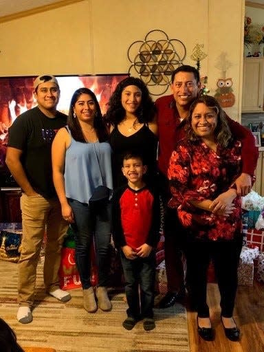 Dario Carvajal-Dominguez (back right) stands with his wife Sugey Martinez (left), son Alex Carvajal-Dominguez (front center), daughter Kimberly Carvajal-Dominguez (back center), daughter Anahli Alverado (right), and son-in-law Antonio Alvarado (far left).