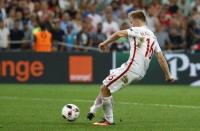 Poland's Jakub Blaszczykowski misses during the penalty shootout REUTERS/Kai Pfaffenbach