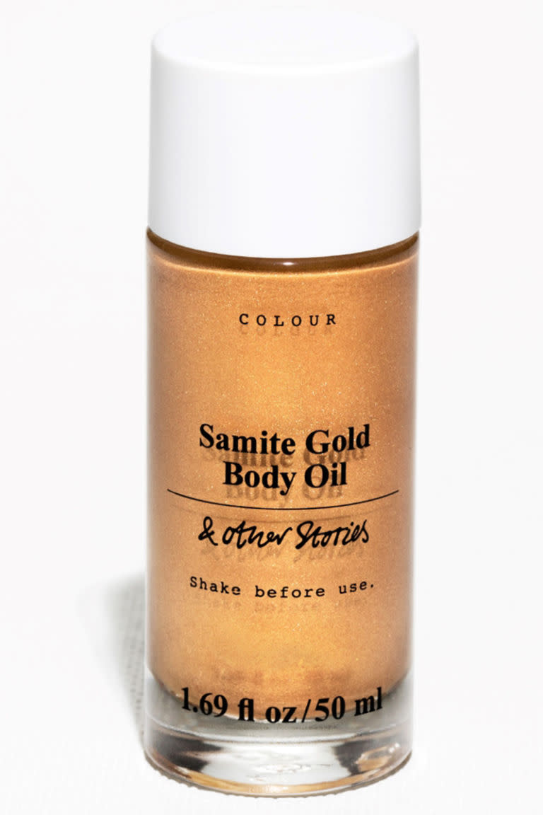 <p>Don't let the blindingly bright gold color put you off: The fine shimmer goes on subtly and does to the shins of your legs what highlighter does to your cheekbones. </p><p><strong>& Other Stories</strong> Samite Gold Shimmer Body Oil, $29, <a rel="nofollow noopener" href="http://www.stories.com/us/Beauty/Bath_Body/Body_moisturisers/Samite_Gold_Shimmer_Body_Oil/590727-102621600.1" target="_blank" data-ylk="slk:stories.com;elm:context_link;itc:0;sec:content-canvas" class="link ">stories.com</a>.</p>