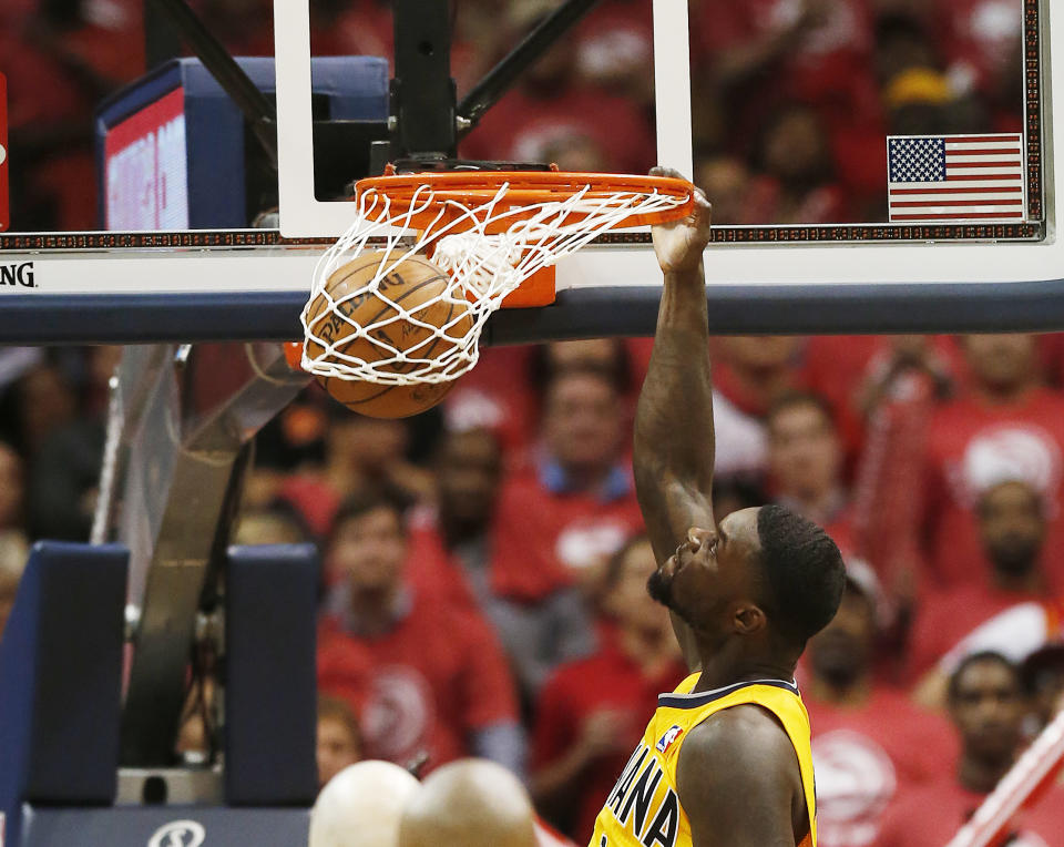 Indiana Pacers guard Lance Stephenson (1) scores against the Atlanta Hawks in the second half of Game 6 of a first-round NBA basketball playoff series in Atlanta, Thursday, May 1, 2014. Indiana won 95-88. (AP Photo/John Bazemore)