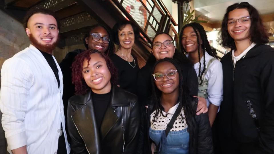 Bowie State President Aminta Breaux gathers with students after watching MJ: The Musical in London.