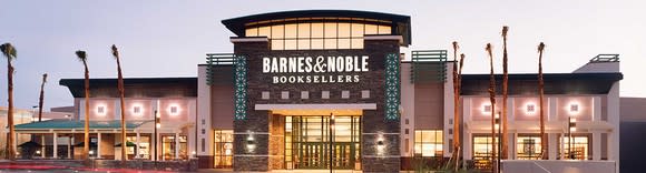 Barnes & Noble Booksellers location with palm trees in front.