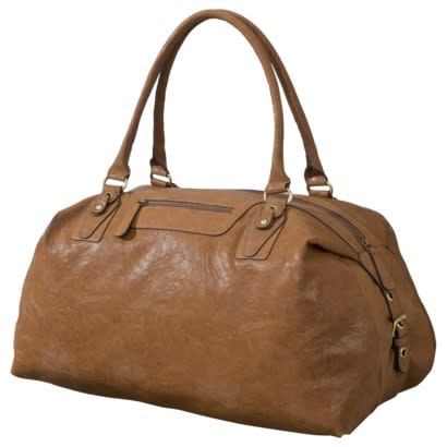 <div class="caption-credit"> Photo by: Target</div><b>Overnight Bag</b> <br> You need at least one bag that's perfect for a quick overnight getaway. Just big enough to fit the necessities for a great night away from home. This simple tan looks so classic and will match just about anything. <br> <a rel="nofollow noopener" href="http://blogs.babble.com/family-style/2012/11/12/7-handbags-every-woman-must-own/#overnight-bag" target="_blank" data-ylk="slk:Get it here;elm:context_link;itc:0;sec:content-canvas" class="link "><i>Get it here</i></a> <br> <b><a rel="nofollow noopener" href="http://blogs.babble.com/family-style/2012/10/03/fall-trend-17-ankle-booties-i-have-to-have/#more-78592" target="_blank" data-ylk="slk:Related: 17 edgy ankle boots to rock this fall;elm:context_link;itc:0;sec:content-canvas" class="link "><i>Related: 17 edgy ankle boots to rock this fall</i></a></b>