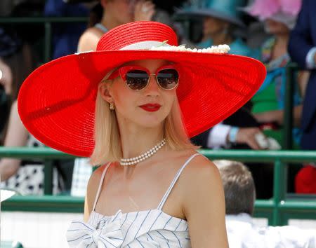 May 7, 2016; Louisville, KY, USA; Patrons wear derby hats and costumes before the 142nd running of the Kentucky Derby at Churchill Downs. Brian Spurlock