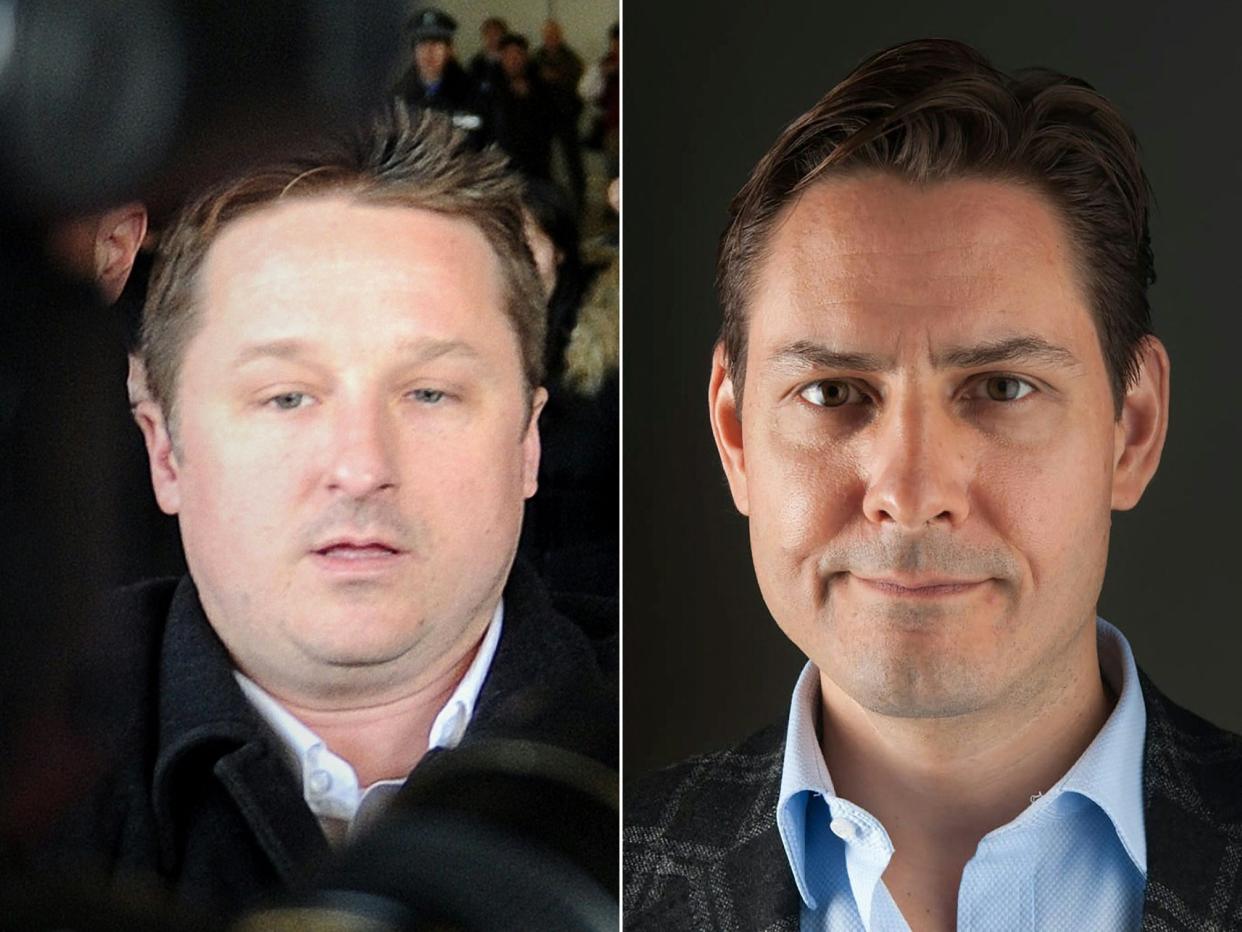 Michael Spavor and Michael Kovrig  (CRISIGROUP/AFP via Getty Images)