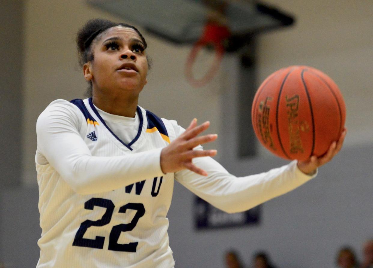 Ty'Naha Mitchell of Oklahoma Wesleyan University is all focus during a women's basketball home game on Jan. 26, 2023.