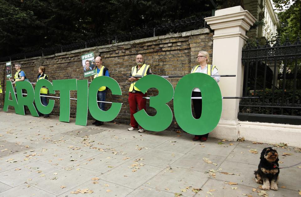 Demonstrators protest against the detention of thirty of Greenpeace campaigners, outside the Russian Embassy in London