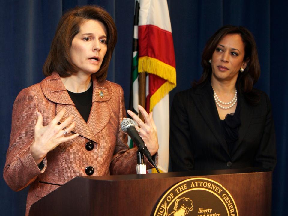Attorneys Catherine Cortez Masto of Nevada, left, and General Kamala D. Harris of California announce a joint investigation alliance to assist homeowners who have been harmed by misconduct and fraud in the mortgage industry, during a news conference in Los Angeles Tuesday, Dec. 6, 2011. (AP Photo/Damian Dovarganes)