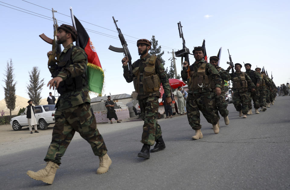 Afghan militiamen join Afghan defense and security forces during a gathering in Kabul, Afghanistan, Wednesday, June 23, 2021. Taliban gains in north Afghanistan, the traditional stronghold of the country's minority ethnic groups who drove the insurgent force from power nearly 20 years ago, has driven a worried government to resurrect militias whose histories have been characterized by chaos and widespread killing. (AP Photo/Rahmat Gul)