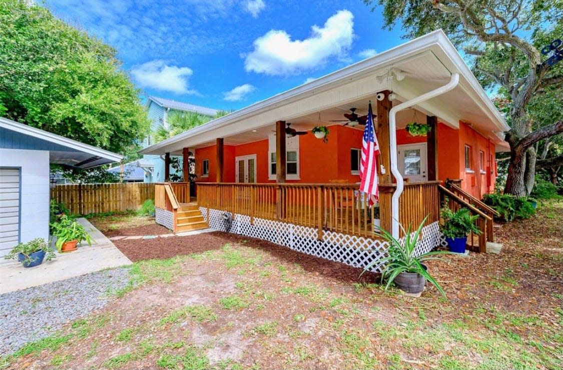 With beautiful porches on the front and back of the home, you can spend endless hours outside, enjoying the mature landscaping and ocean breezes.