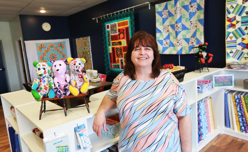 Somerset's Tammy Ruggeri, owner of Puddle Jumper Quilts in Dighton, at the new store on Friday, May 6, 2022. Puddle Jumper Quilts offers quilting fabrics, supplies, lessons and support and specializes in custom-design quilts and memory bears.   