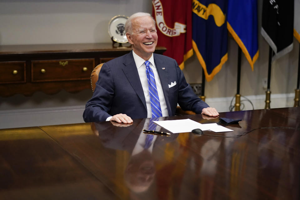 President Joe Biden congratulates NASA's Jet Propulsion Laboratory Mars 2020 Perseverance team for successfully landing on Mars during a virtual call in the Roosevelt Room at the White House, Thursday, March 4, 2021. (AP Photo/Andrew Harnik)