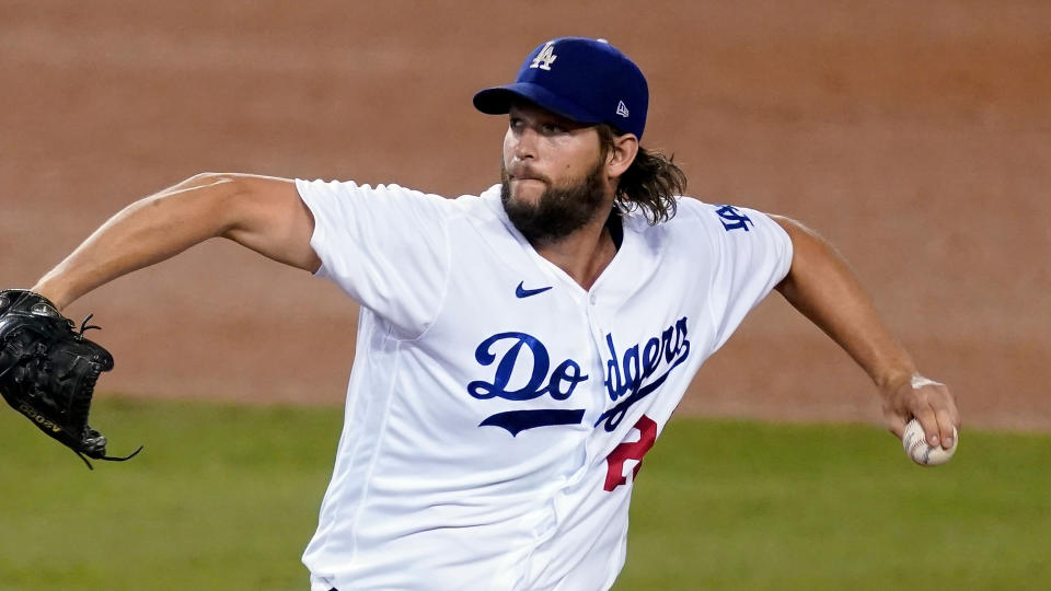 Los Angeles Dodgers starting pitcher Clayton Kershaw throws to the Milwaukee Brewers in Game 2 of a National League wild-card baseball series Thursday, Oct. 1, 2020, in Los Angeles. (AP Photo/Ashley Landis)