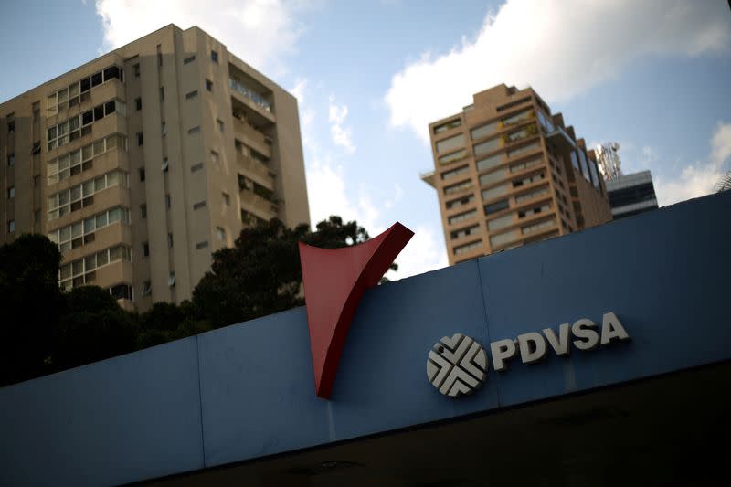 FILE PHOTO: The corporate logo of the state oil company PDVSA is seen at a gas station in Caracas