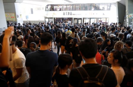 Demonstrators arrive at the Admiralty station of Mass Transit Railway (MTR) to attend a protest in Hong Kong