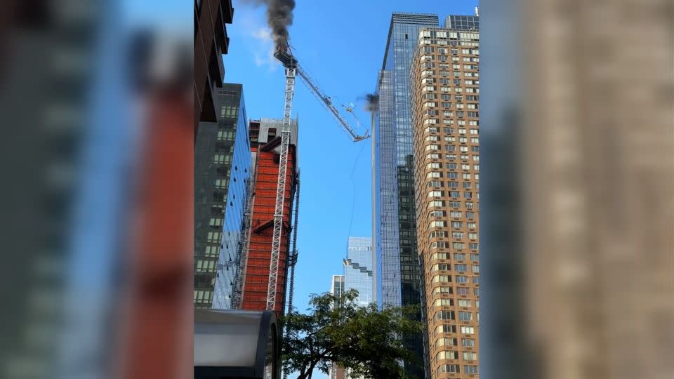 A crane collapses at a vacant construction site in Manhattan on Wednesday. - From  @jimmy_farring/Twitter